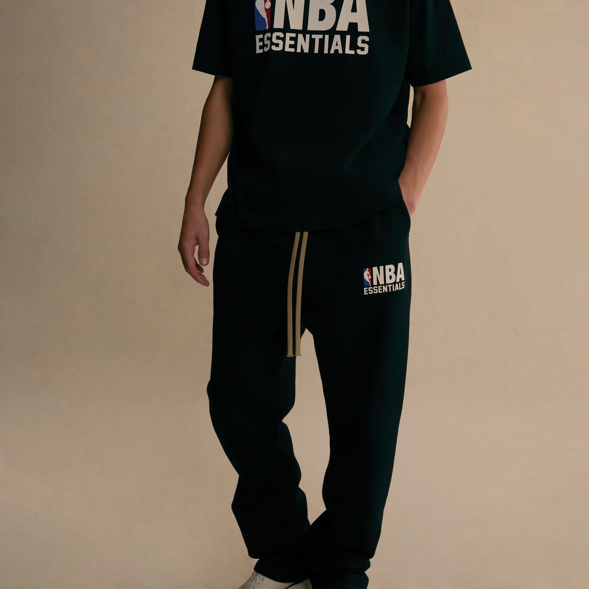 Fear of God Essentials NBA Black Sweatpants On Body