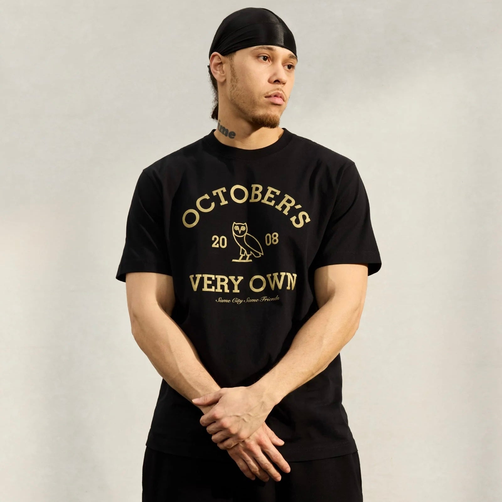 OVO Black Gold Collegiate T-Shirt On Body