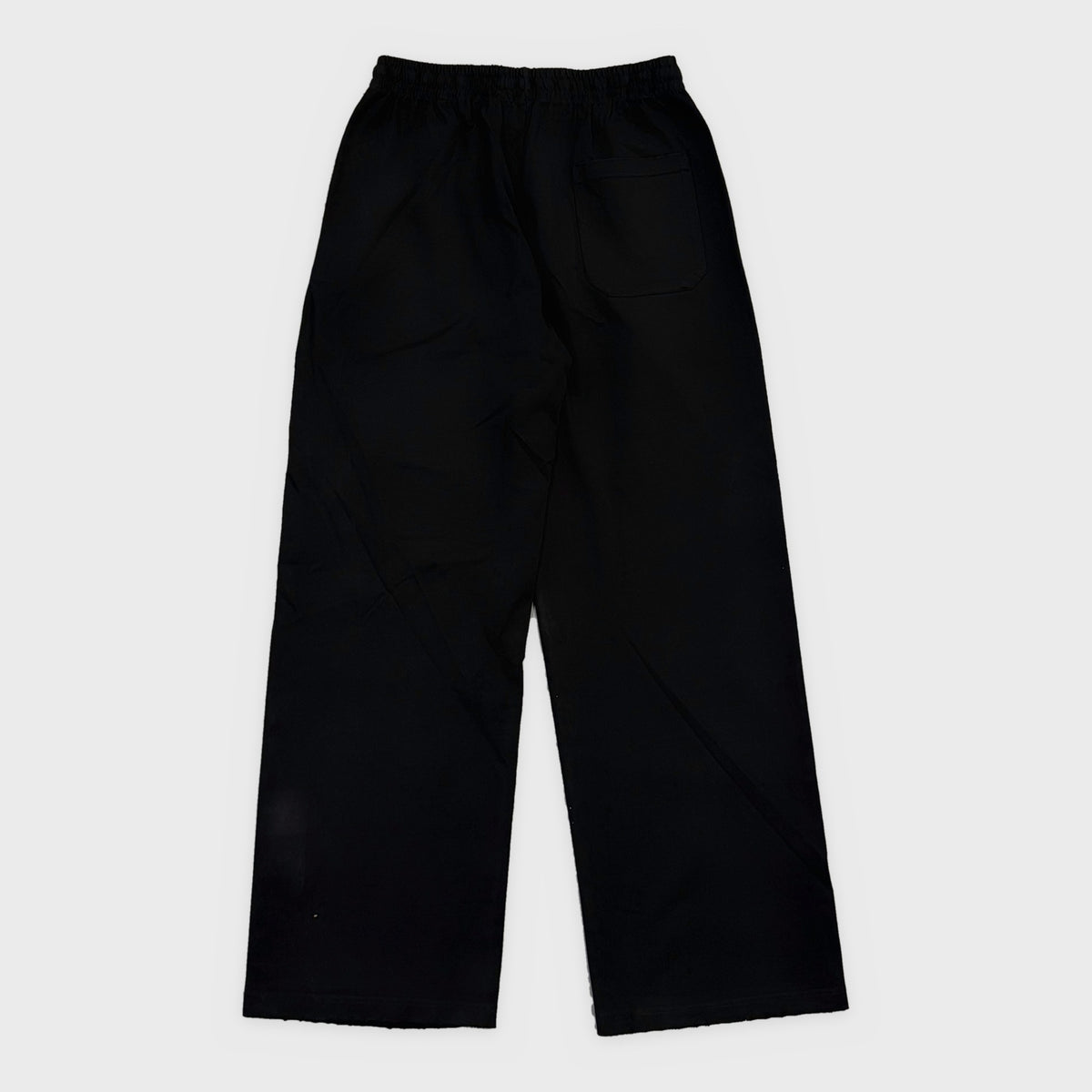 HMDD Black Holy Cross Sweatpants, back of the plain black sweatpants with elastic waistband
