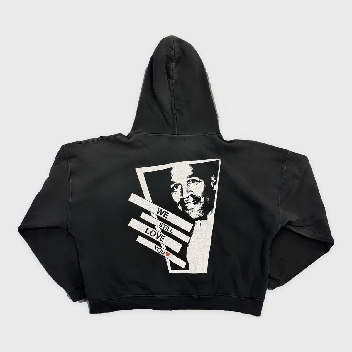 HMDD Black OJ Zip Hoodie, back with a large black and white portrait and We Still Love You banner text