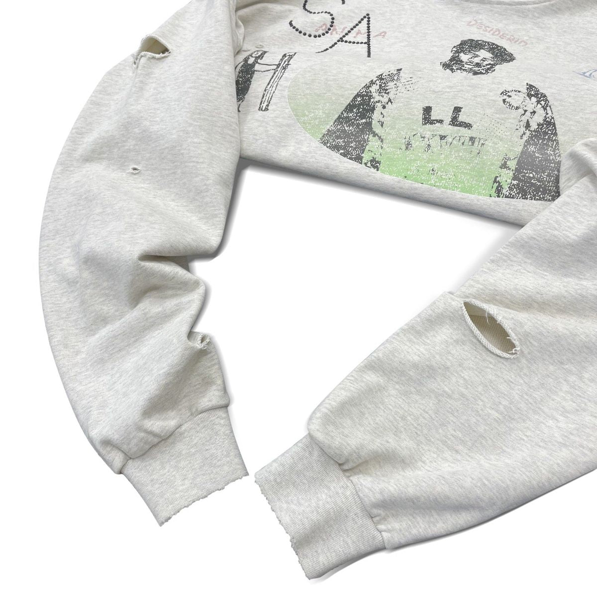 Close-up of the cut-out distressing on the sleeve and cuff of the Animato Hoodie