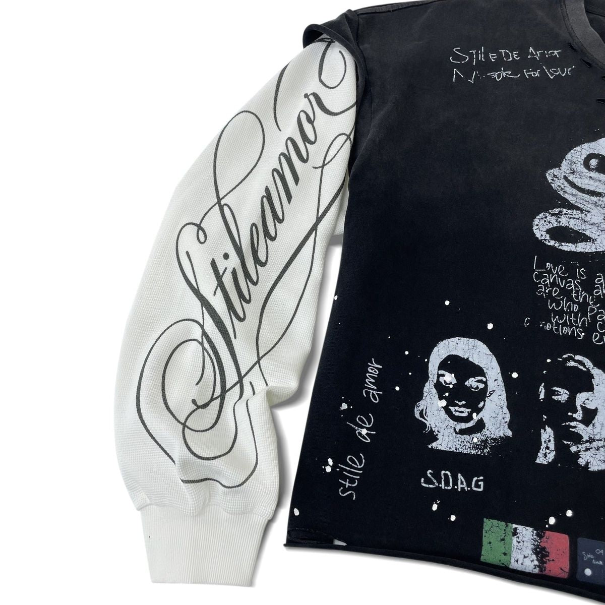 Close-up of the white sleeve with black Stileamor script on the Black Sqaudra Long Sleeve