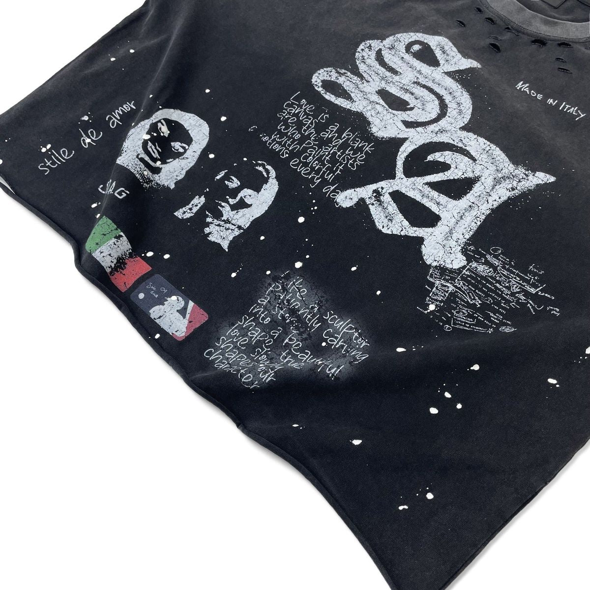 Close-up of the SA monogram, portrait graphics and flag-colour blocks on the Black Sqaudra Long Sleeve