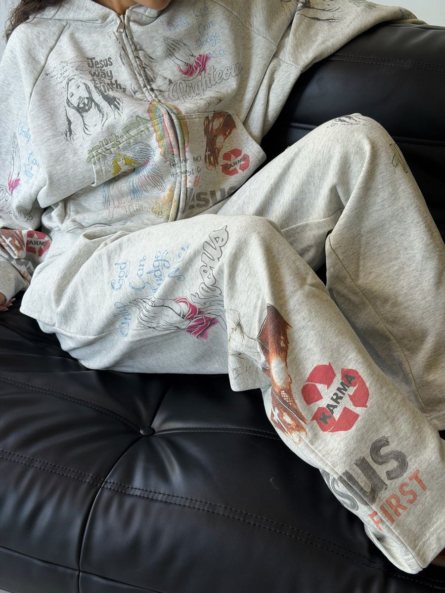 Close-up of the Shibuya Sweatpants worn with the Shibuya Zip Hoodie showing the leg prints